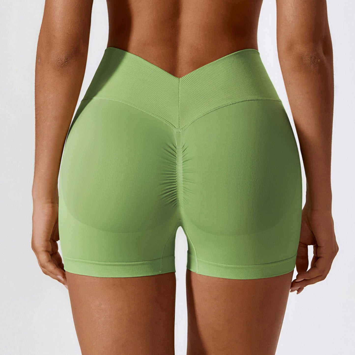 BOOTY CONTOURING MINI SHORTS IN GREEN
