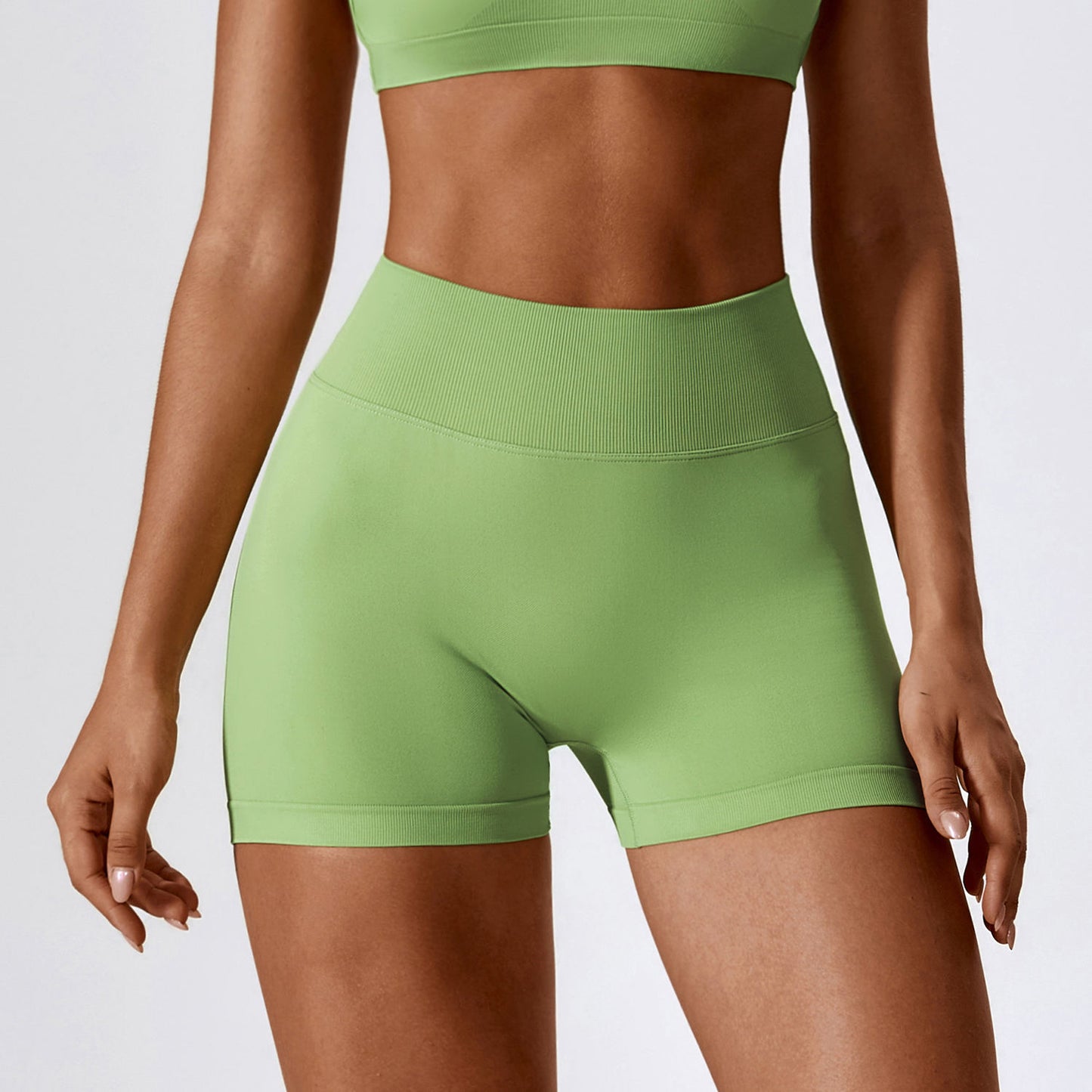 BOOTY CONTOURING MINI SHORTS IN GREEN