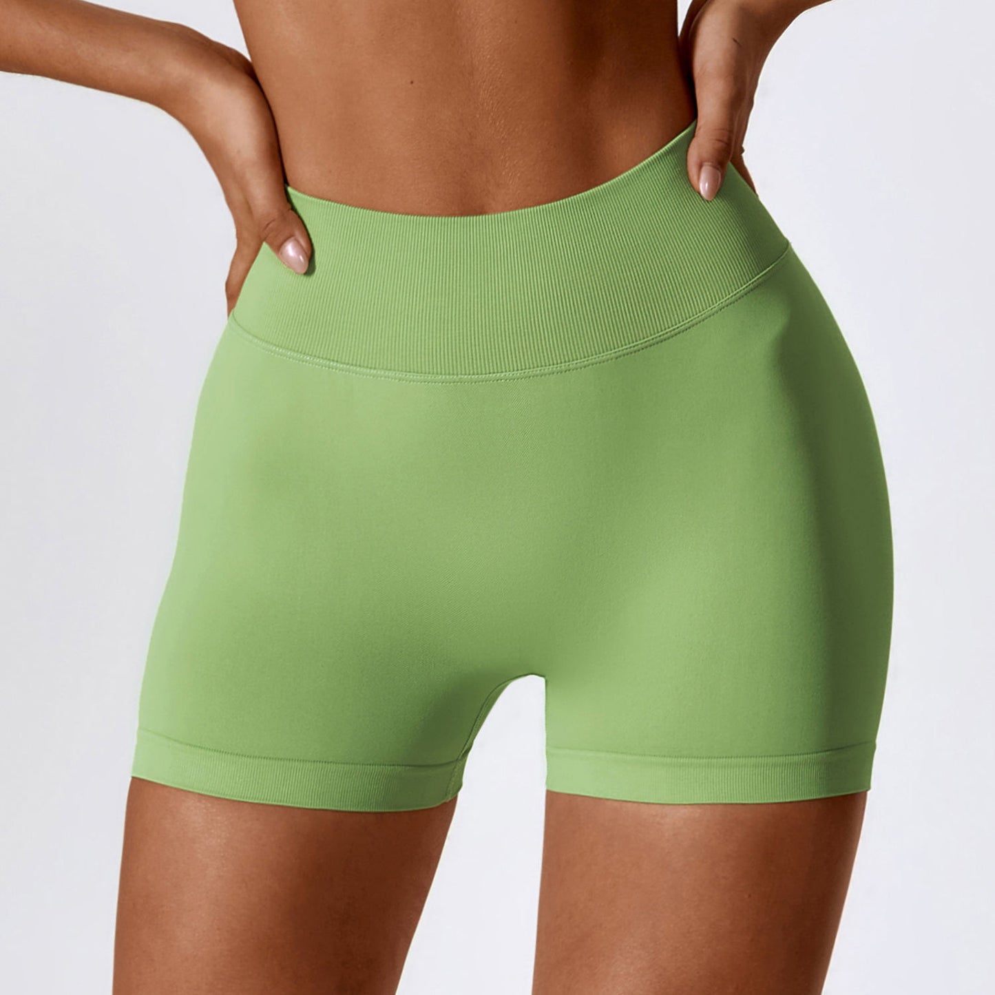 BOOTY CONTOURING MINI SHORTS IN GREEN