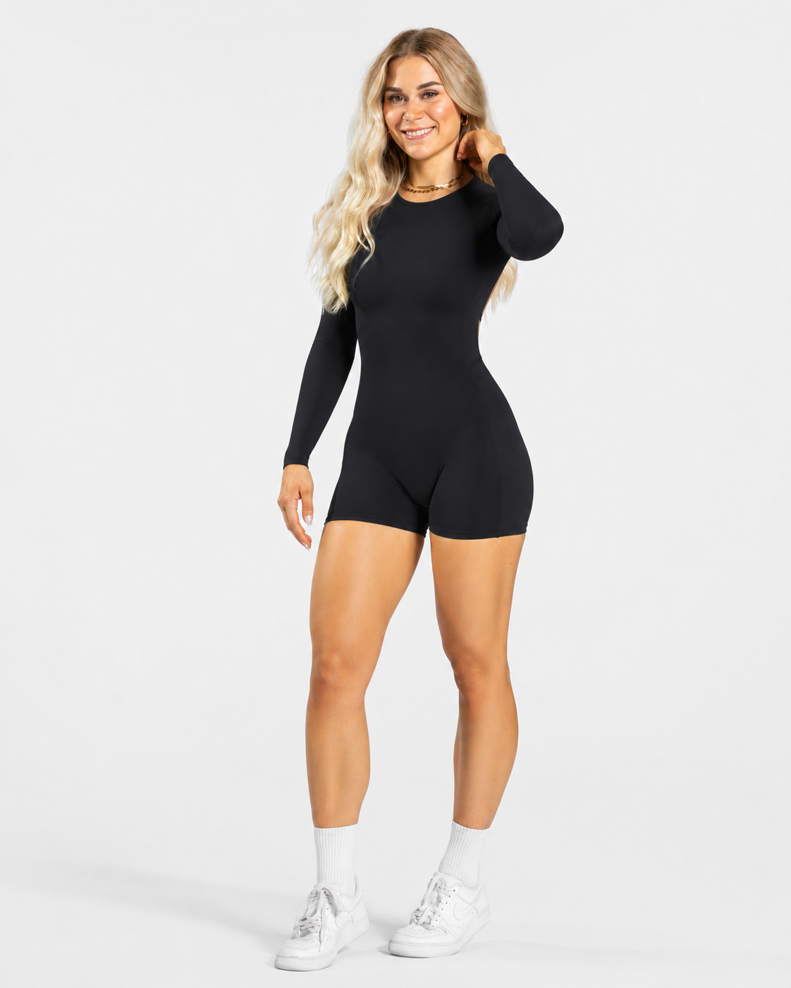 BEXIA Petite Long Sleeve Open Back Romper in Black — full-length front view