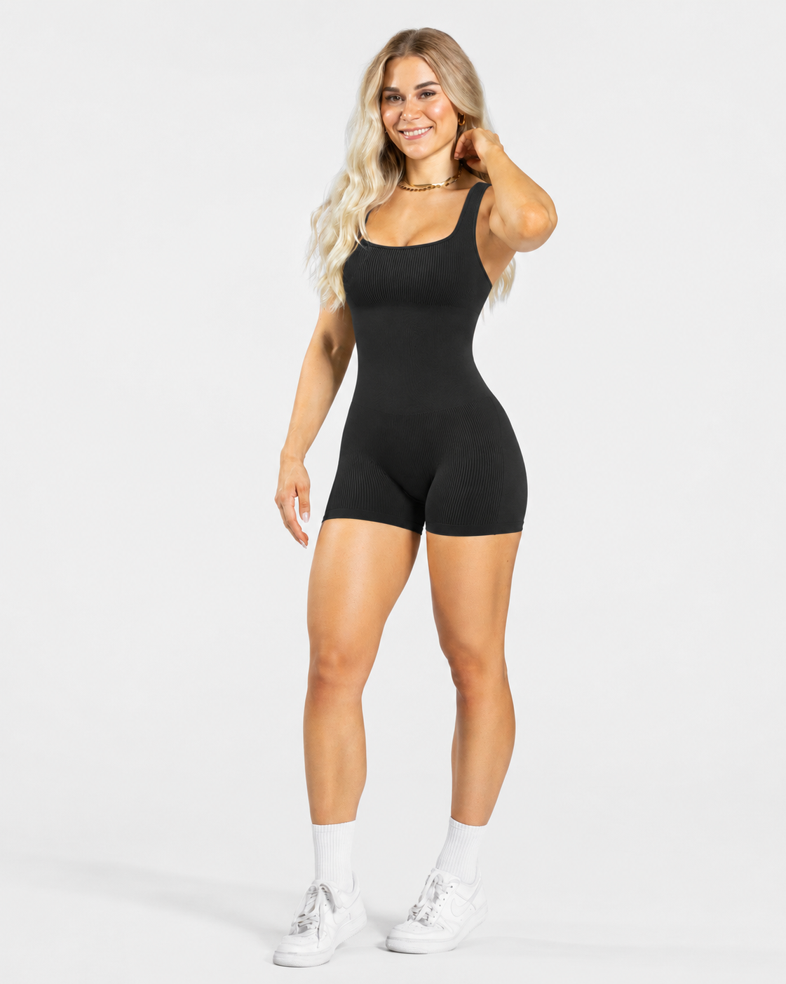 BEXIA Petite Padded Seamless Cami Romper in Black — full-length front view
